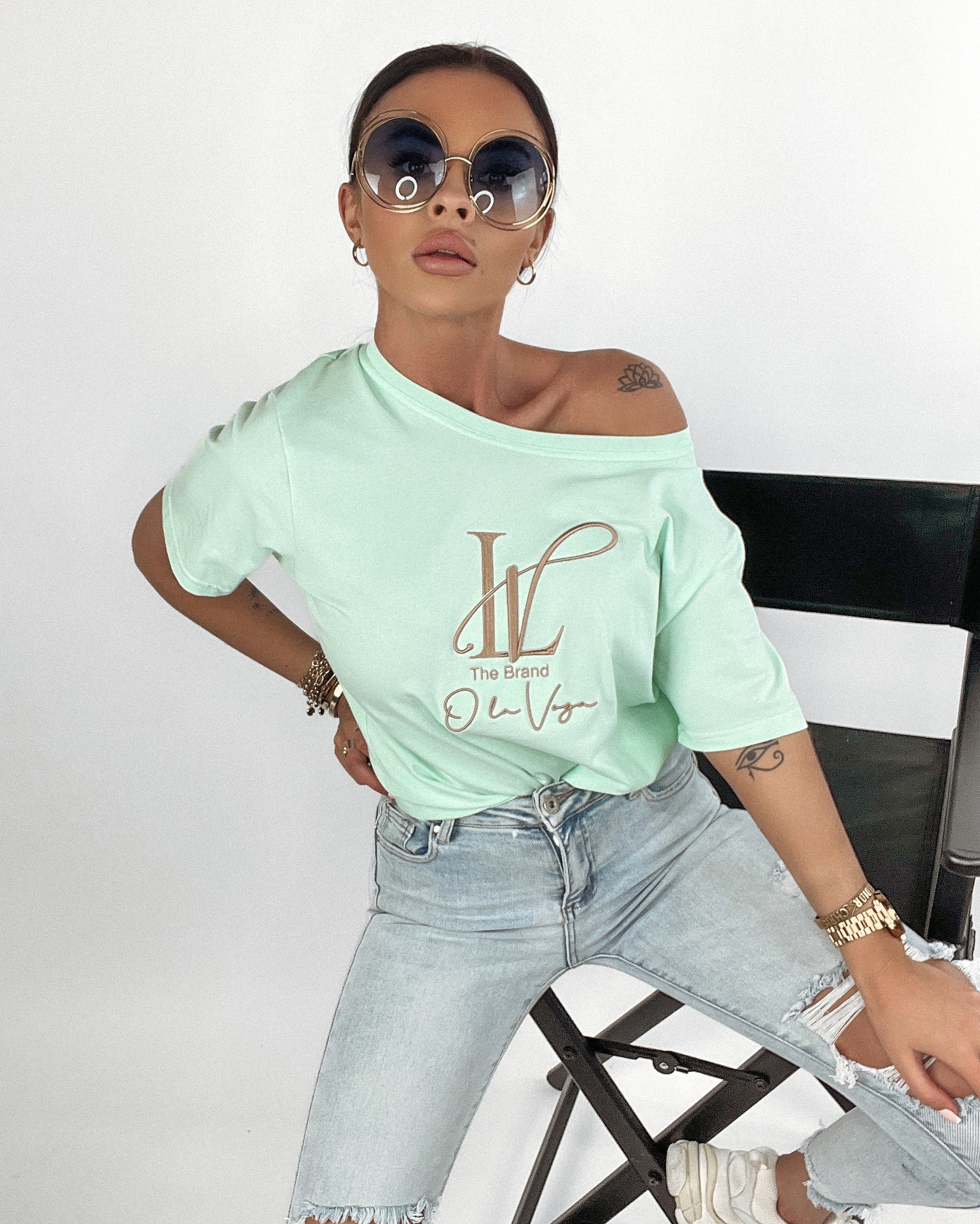 T-shirt bawełniany z nadrukiem Brand miętowy