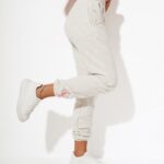 Spodnie ze ściągaczem Naomi O'la Voga beżowy melanż