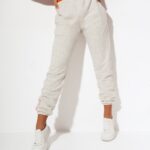 Spodnie ze ściągaczem Naomi O'la Voga beżowy melanż