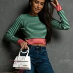 Sweterek w paski Laden zielony