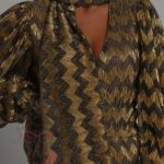 Kombinezon imprezowy NB Zigzag złoto-czarny