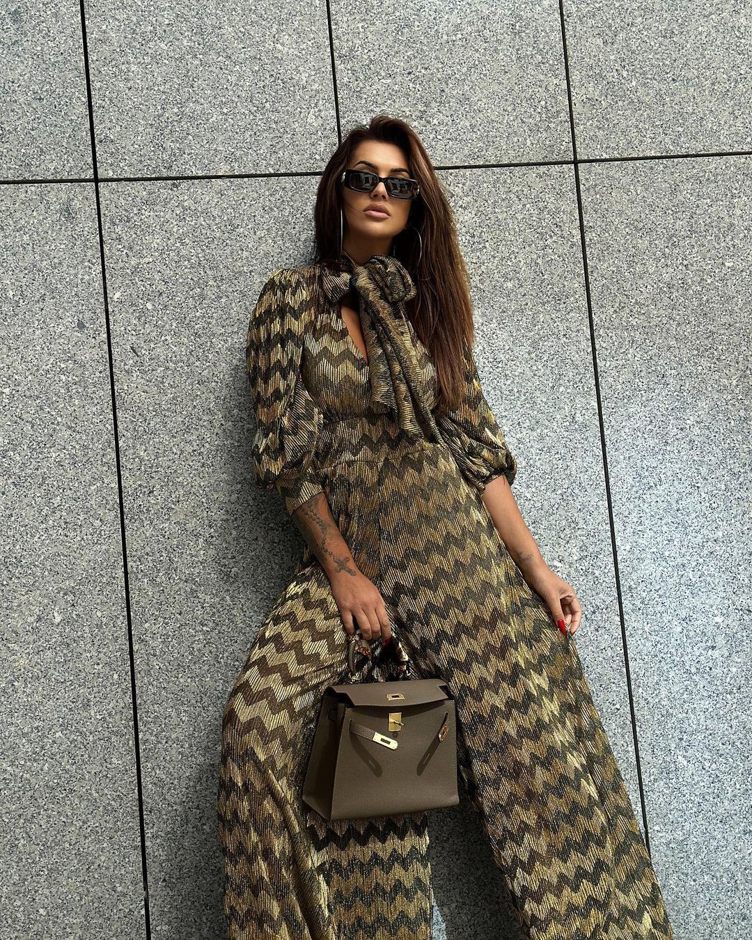 Kombinezon imprezowy NB Zigzag złoto-czarny