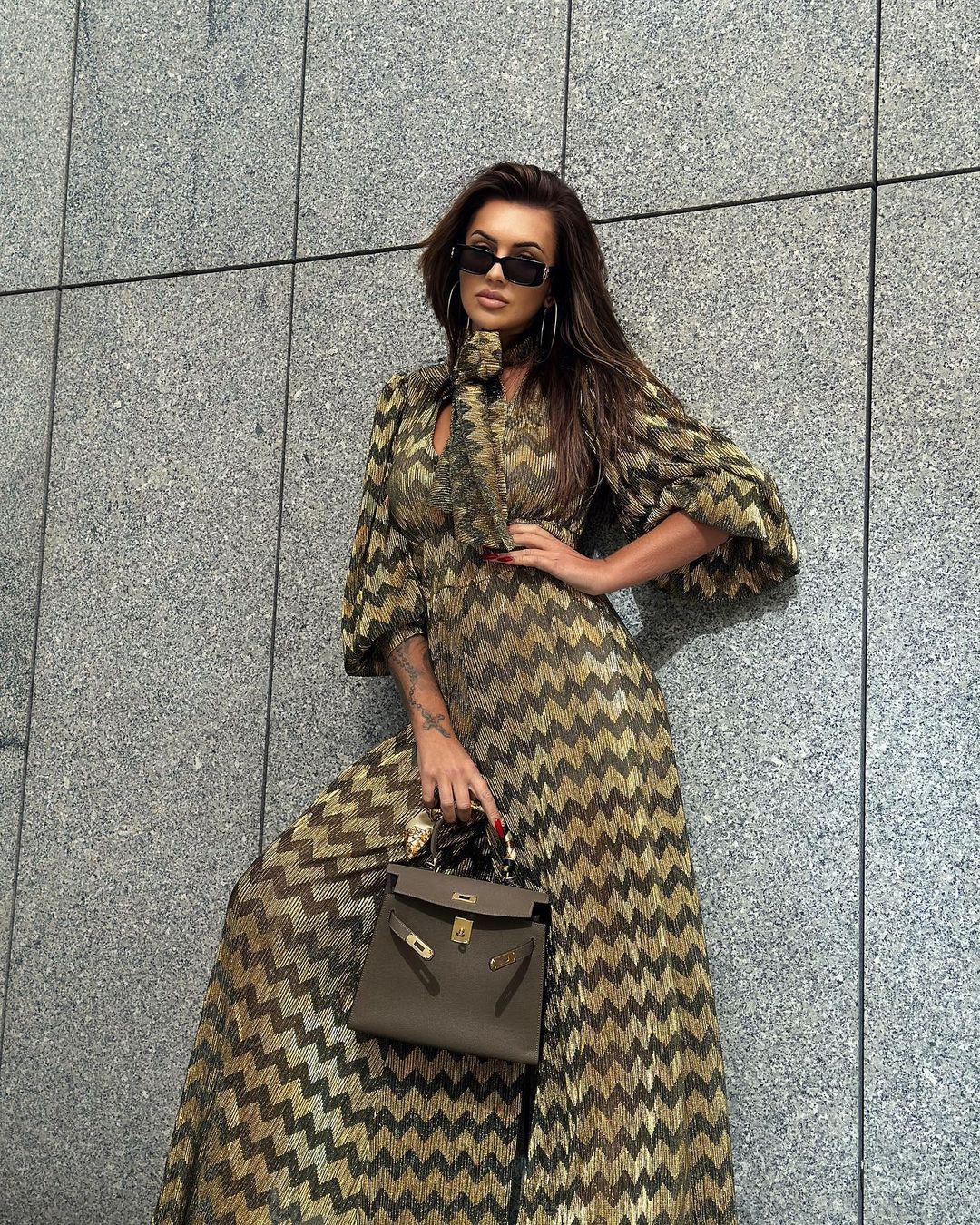 Kombinezon imprezowy NB Zigzag złoto-czarny