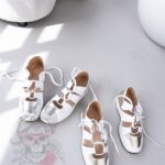 Buty sportowe z wycięciami Madam Moso białe/ złote