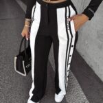 PRZEDSPRZEDAŻ Spodnie z lampasami CLYDE OLAVOGA czarne