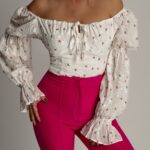 Spodnie eleganckie rozszerzane Hipnosis amarantowe