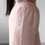 Spodnie sportowe bawełniane HOYO OLAVOGA pudrowy róż