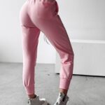 Spodnie sportowe damskie MIRACLE OLAVOGA pudrowy róż