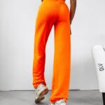 Spodnie damskie dresowe z wycięciem Scarlet Ola Voga pomarańczowe