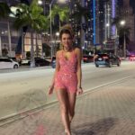 Kombinezon cekinowy NB Pops rożowo-pomarańczowy