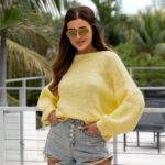 Sweter z kokardami Caset żółty