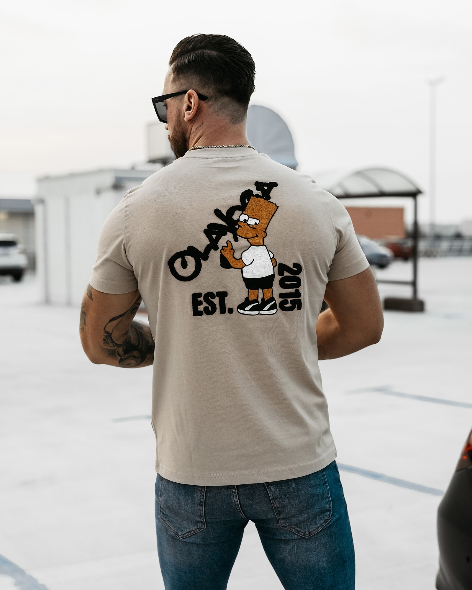 T-shirt męski z kultową grafiką GRAFFITI GROOVE OLAVOGA beżowy