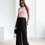 Spodnie z wyższym stanem dzwony NAVEEN OLAVOGA czarne