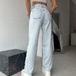 Spodnie jeansowe z przetarciami Gusty jasnoniebieskie