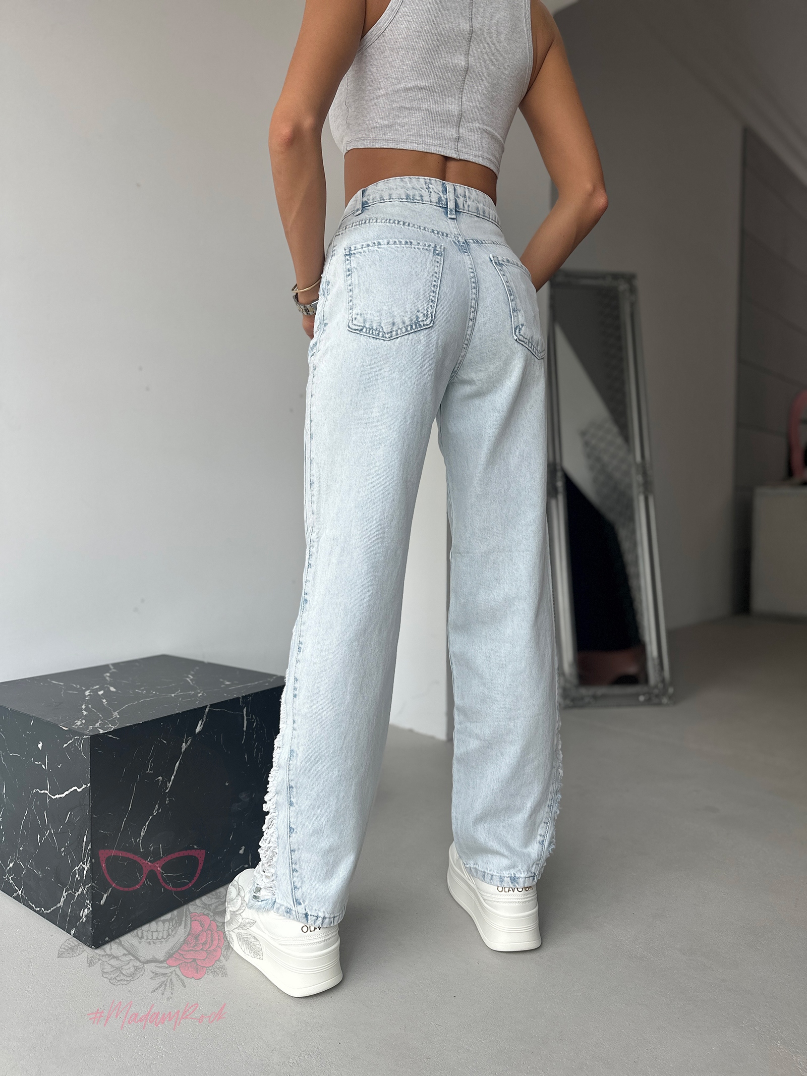 Spodnie jeansowe z przetarciami Gusty jasnoniebieskie