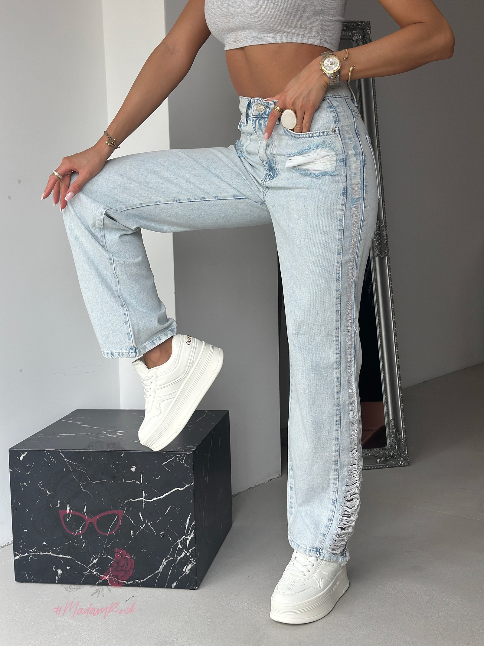 Spodnie jeansowe z przetarciami Gusty jasnoniebieskie