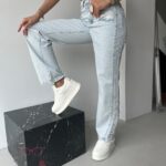 Spodnie jeansowe z przetarciami Gusty jasnoniebieskie